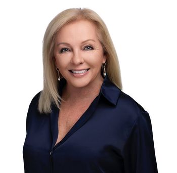 Portrait of Sally Bauscher, REALTOR®.